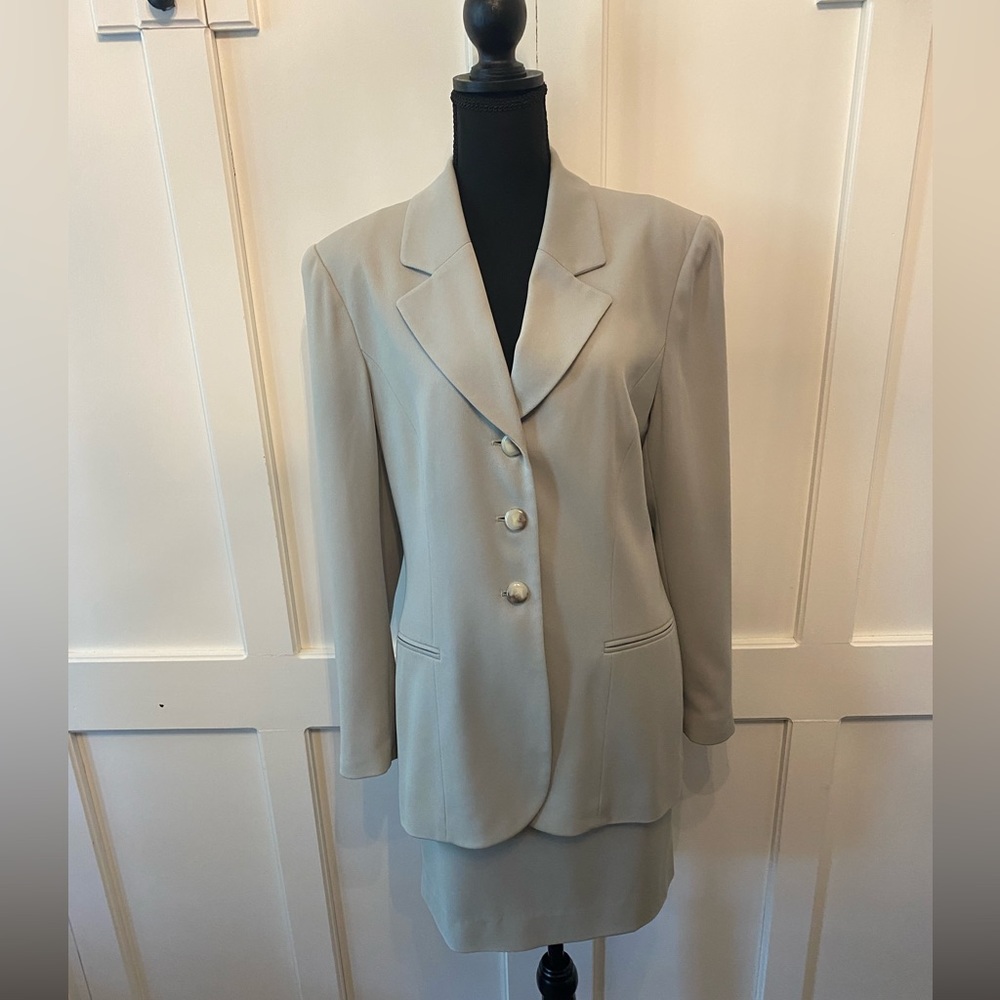 Two piece jacket and skirt in celadon green